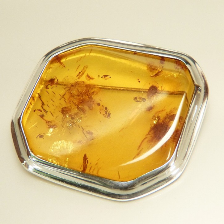Bernstein-Brosche in Silber