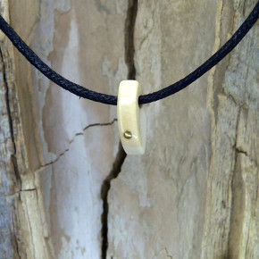 Mammut-Anhänger mit poliertem Messing